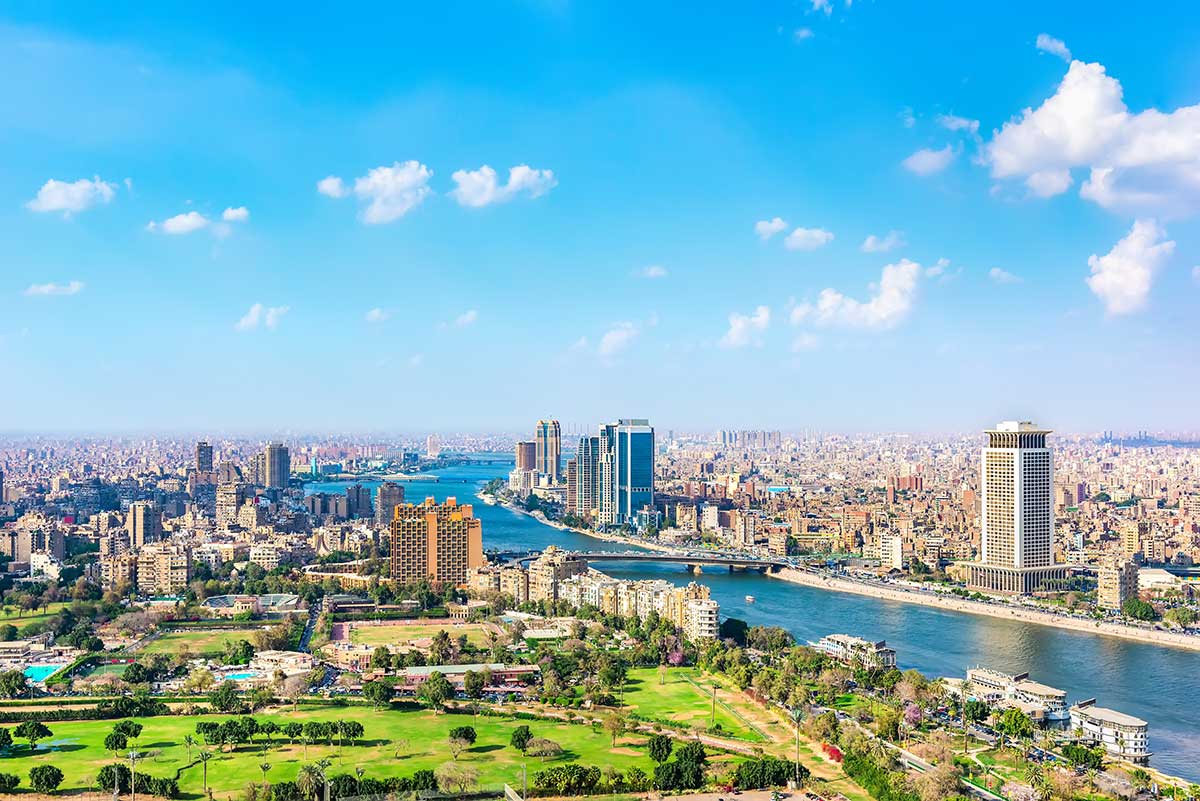 Aerial view of central Cairo with the Nile bending through the city.